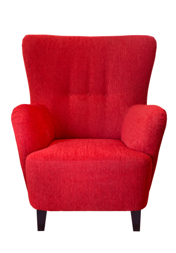 Isolated red armchair.